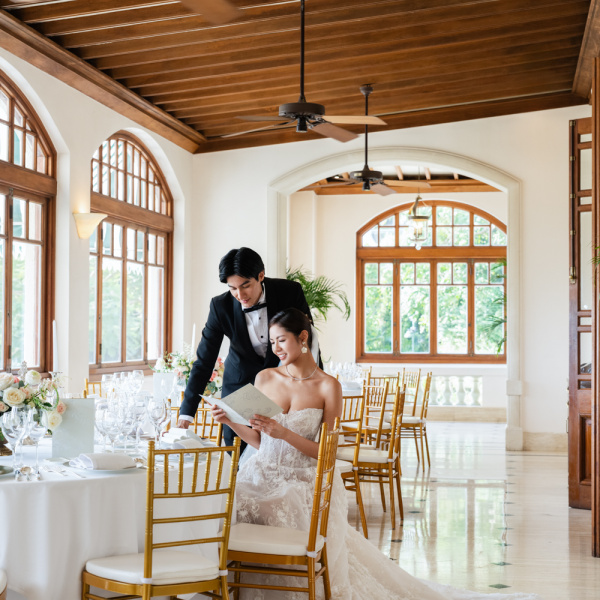 Verandah Couple Reading Menu